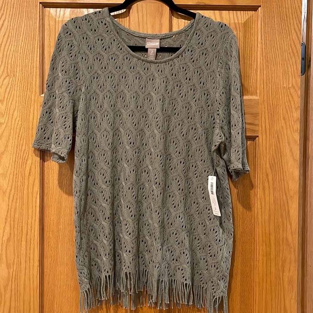 Chicos women’s size 2 olive green short sleeved sweater with fringe bottom NWT
